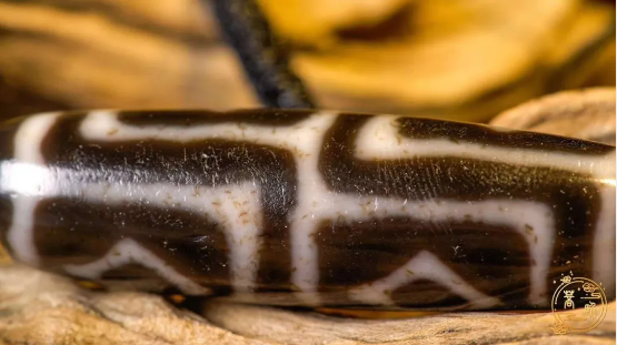 80 million: A tiny dzi bead can be exchanged for a villa