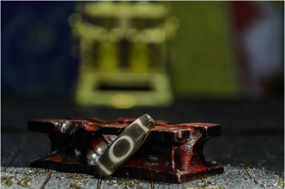 80 million: A tiny dzi bead can be exchanged for a villa