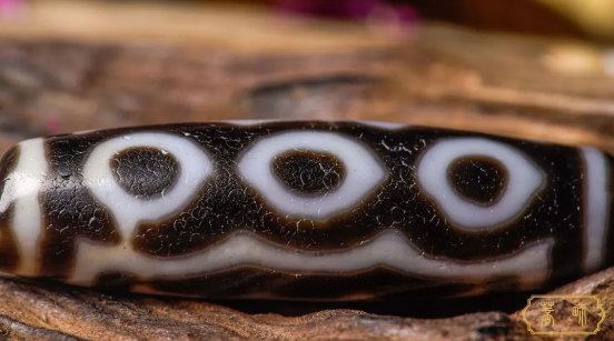 80 million: A tiny dzi bead can be exchanged for a villa