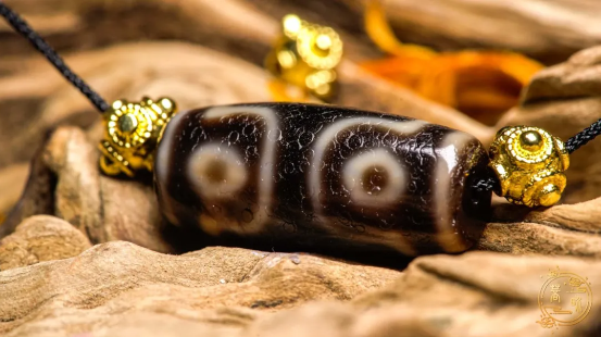 80 million: A tiny dzi bead can be exchanged for a villa