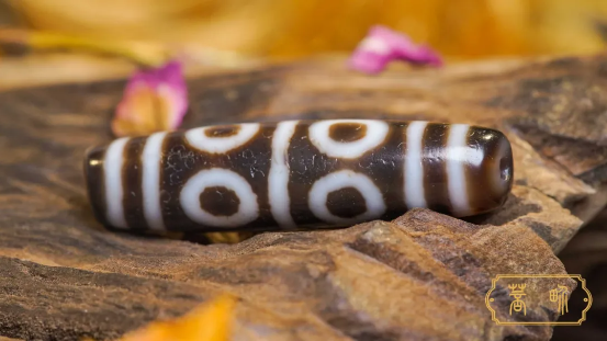 80 million: A tiny dzi bead can be exchanged for a villa