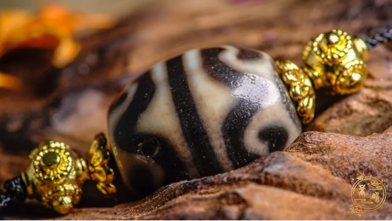 80 million: A tiny dzi bead can be exchanged for a villa